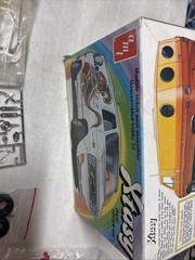 AMT Xtasy Chevy Custom Van Unassembled Plastic Model Kit X1