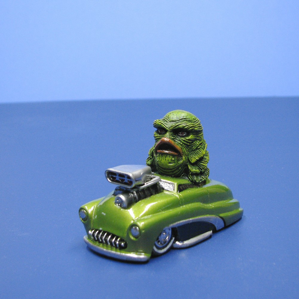 Jimmy Flintstone resin Lil Shitzz “The Creature” aboard a ’49 Merc LS6