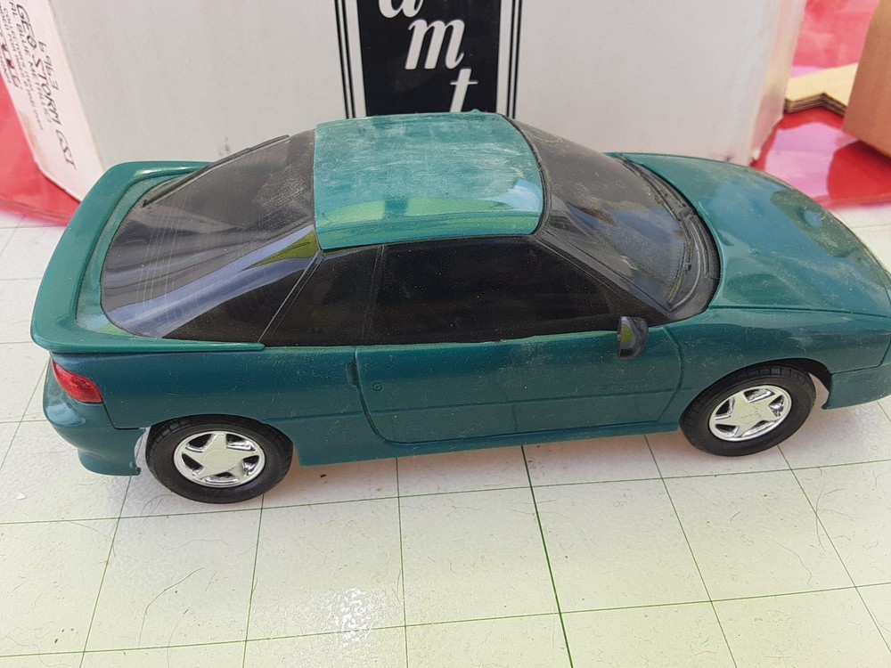 AMT E R T L 1991 Geo Storm GSI Teal Blue Metallic Plastic Front Window Crack