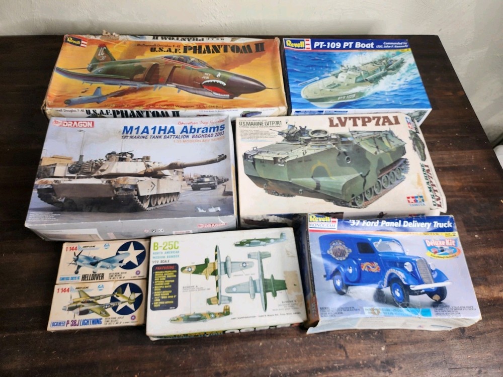 Box of vintage military vehicles models (Lot size 9) Planes Ships Car Tank