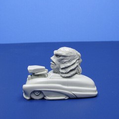 Jimmy Flintstone resin Lil Shitzz “The Creature” aboard a ’49 Merc LS6