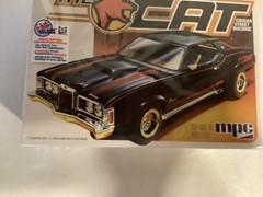 AMT The Cat Cougar 2 in 1 kit. Parts in sealed bags.