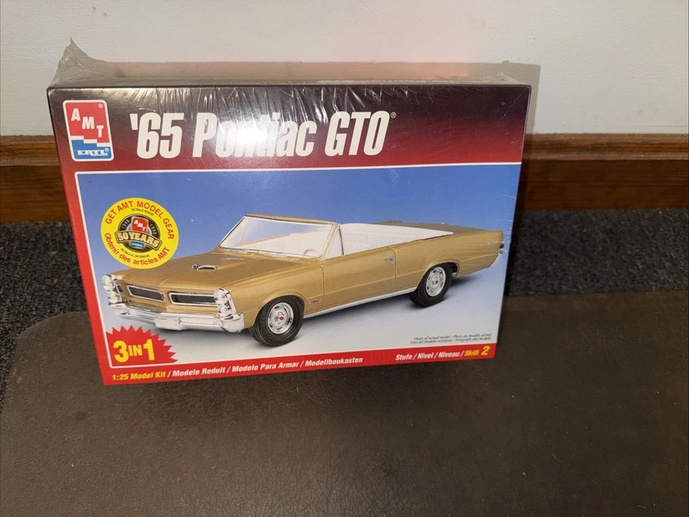 ’65 Pontiac Gold GTO Sealed 1/25 Scale Model Kit 3 In 1 Kit #8201 AMT
