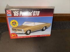 ’65 Pontiac Gold GTO Sealed 1/25 Scale Model Kit 3 In 1 Kit #8201 AMT