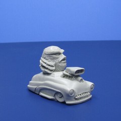 Jimmy Flintstone resin Lil Shitzz “The Creature” aboard a ’49 Merc LS6