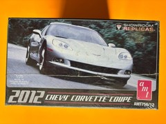 2012 CHEVROLET CORVETTE COUPE MODEL KIT AMT ROUND 2 1/25 SCALE NEW SEALED LOOK!!