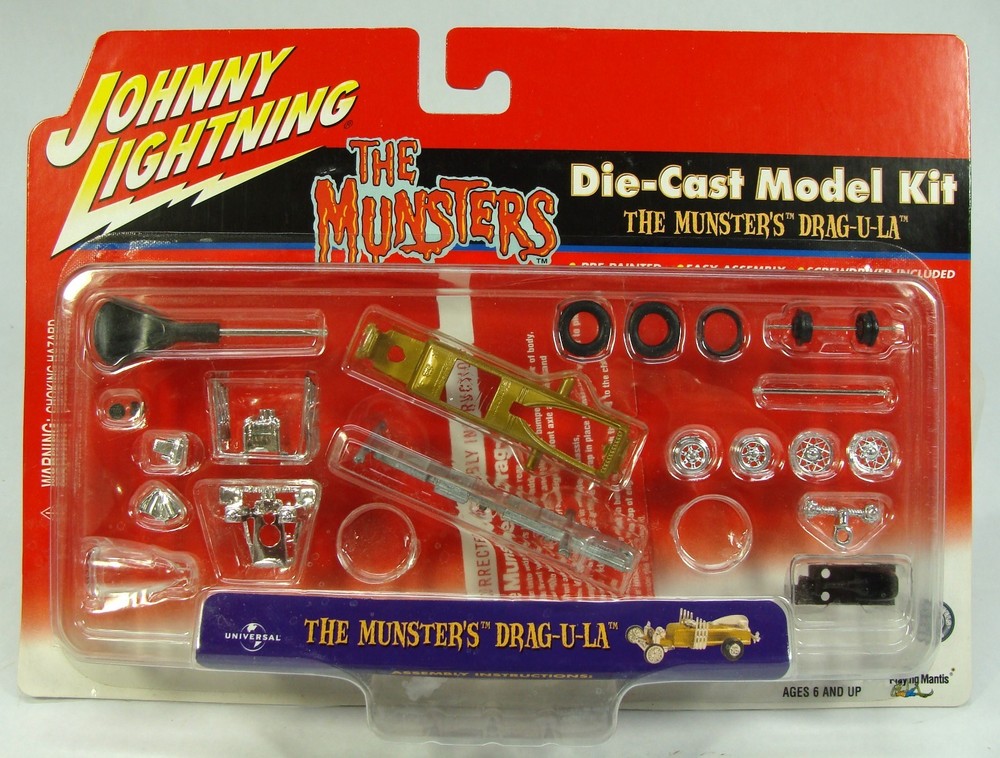 JOHNNY LIGHTNING THE MUNSTER’S DRAG-U-LA DIE-CAST MODEL KIT 1/64TH SCALE GOLD