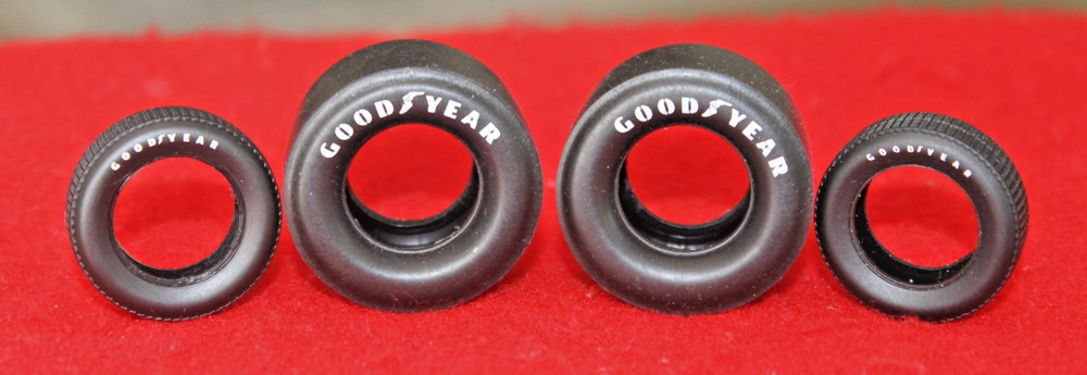 4 (GOOD/YEAR PAD PRINTED WIDE RACING SLICKS AND 2 MATCHING FRONT 1/25 SCALE