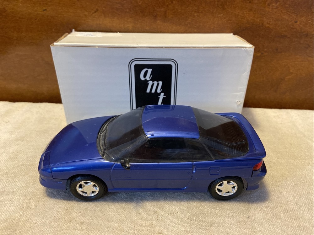 1991 GM CHEVY GEO STORM GSI COBALT BLUE METALLIC PROMO CAR ERTL/AMT