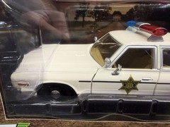 Greenlight 84094 1/24 1975 Dodge Monaco Cream “Hazzard County Sheriff”