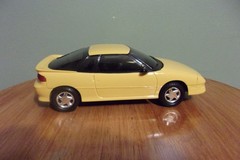AMT Ertl 1991 Geo Storm GSI bright Yellow Dealer Promo car 6083 1:25 NIB