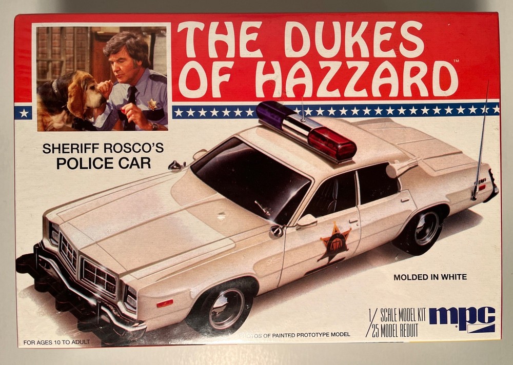 AMT 707 Dukes Sheriff Rosco’s Dodge Monaco Police Car kit 2009, Sealed (B263)