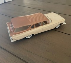 LOOK! 1959 Chevrolet Nomad Station Wagon Dealer Promo Car, Cream/Gold – Friction