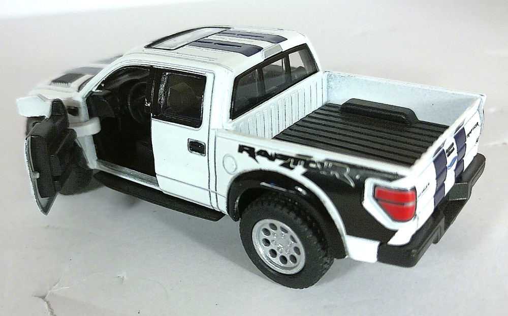 Kintoy White w/ Dark Blue stripes 2013 Ford F150 SVT Raptor die cast pull back
