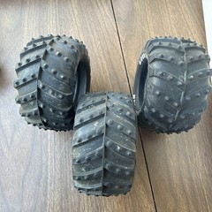vintage 1 1/10 scale monster truck tires featuring prominent Goodyear lettering
