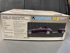 1997 PLYMOUTH PROWLER WITH TRAILER 1/25 AMT / ERTL OPEN BOX – Brand new