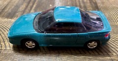 AMT Ertl 1991 Chevrolet Geo Storm GSI #6963 Teal Blue Metallic Promo Model