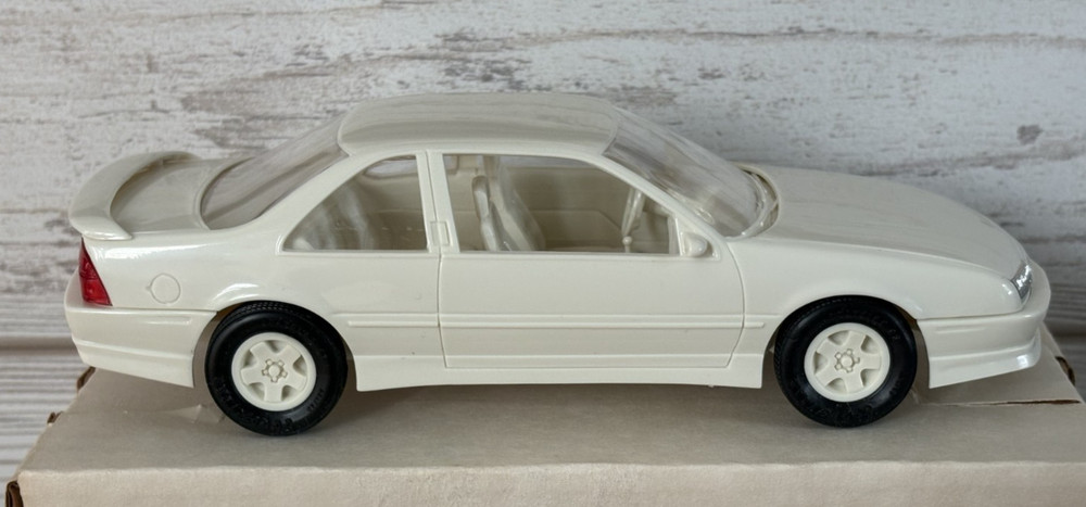 NIB AMT/ERTL 1990 CHEVY BERETTA GTZ WHITE DEALER PROMO MODEL #6037