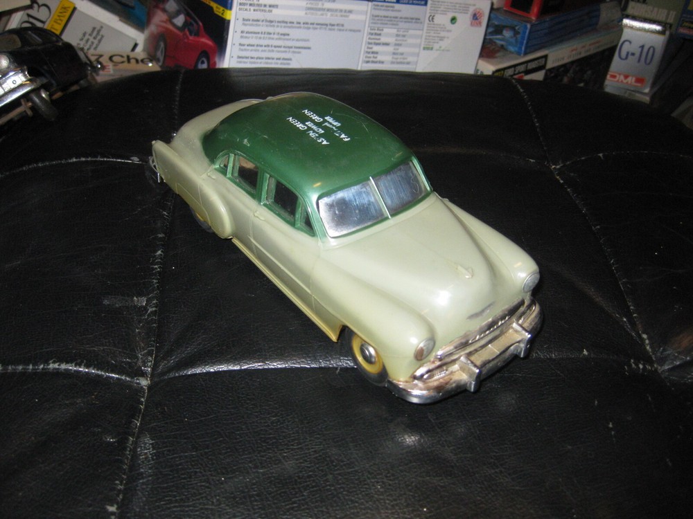 Vintage 1950s Chevrolet Promo Car Bank in two tone green with key in 1/25 scale
