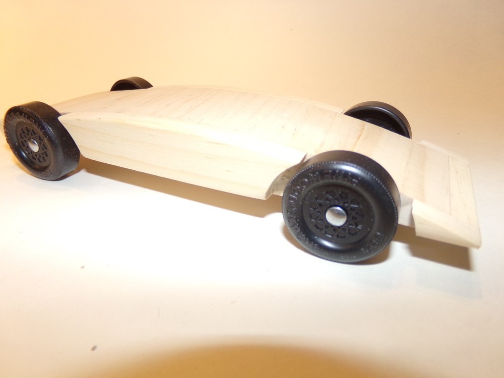 Pinewood Derby Kit Cars with Polished Wheels and Axles with a unpainted body