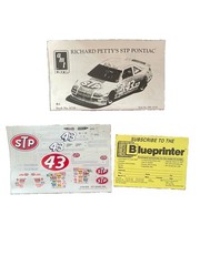 Richard Petty AMT Ertl 6728 1/25 43 STP Pontiac NASCAR Model Kit 1990 Open Box