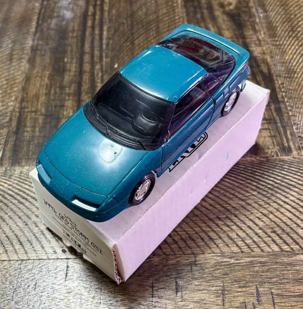 AMT Ertl 1991 Chevrolet Geo Storm GSI #6963 Teal Blue Metallic Promo Model