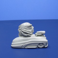 Jimmy Flintstone resin Lil Shitzz “The Creature” aboard a ’49 Merc LS6