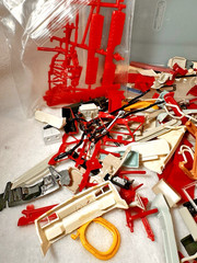 JUNK YARD SUPPLIES Misc. Left Over Model Car and Airplane Parts in Sterilite Tub