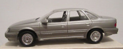 ERTL NIB PROMO CAR 1989 FORD TAURUS SHO LIGHT TITANIUM METALLIC #6054