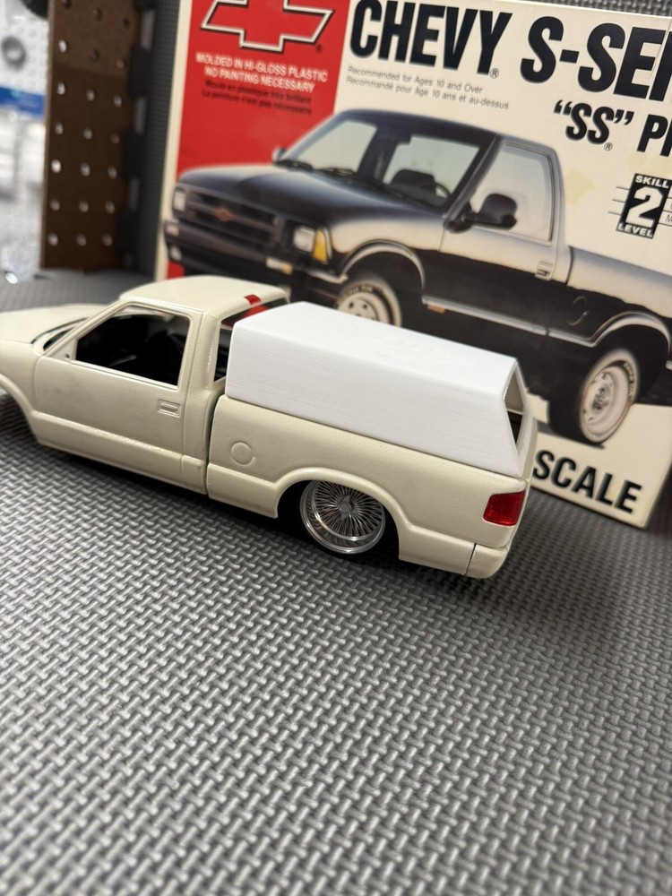 1:20 Chevy S-Series Bed Topper with no side windows. Model kit not included.