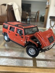Vintage Maisto Orange Hummer Figurine “Avon” 1/24 diecast Collectible Rare