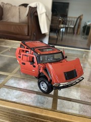 Vintage Maisto Orange Hummer Figurine “Avon” 1/24 diecast Collectible Rare