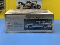 AMT ERTL FORD TAURUS SHO #6145 HTF RELEASED IN 1990 NEW