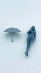 Umbrella holding pit girl