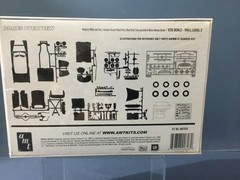 Pair of AMT ’51 Chevys. 1 Convert. Factory sealed 1 Sedan open box 608,6607