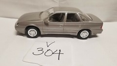 NIB Ertl 1/24 scale 1989 Ford Taurus SHO ( Titanium Met ) promo model #6054
