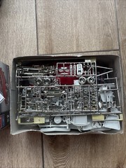 two 1:25 scale plastic model kits- ‘49 Mercury and ‘69 Shelby GT-500
