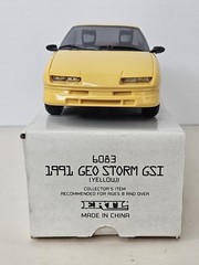 AMT Ertl 1991 Geo Storm GSI Yellow Dealer Promo Model Car 6083 1:25 NIB