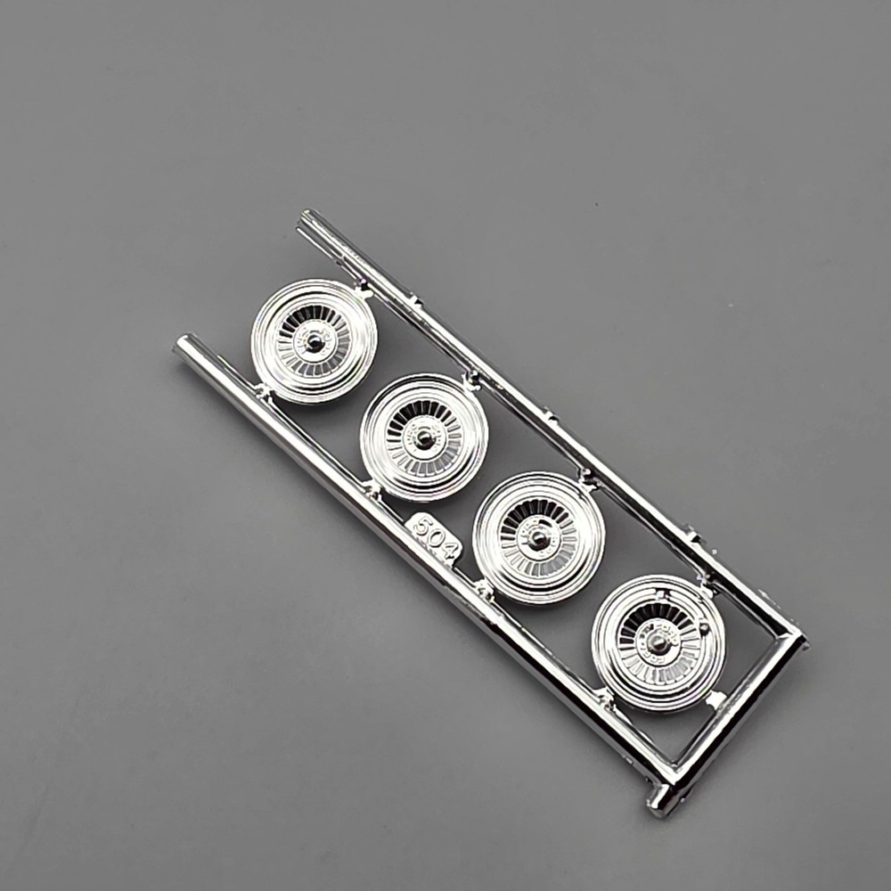 AMT 31838 1/25 57 Ford Fairlane Parts Kit Bash Chrome Wheels