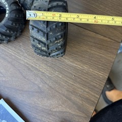 vintage 1 1/10 scale monster truck tires featuring prominent Goodyear lettering