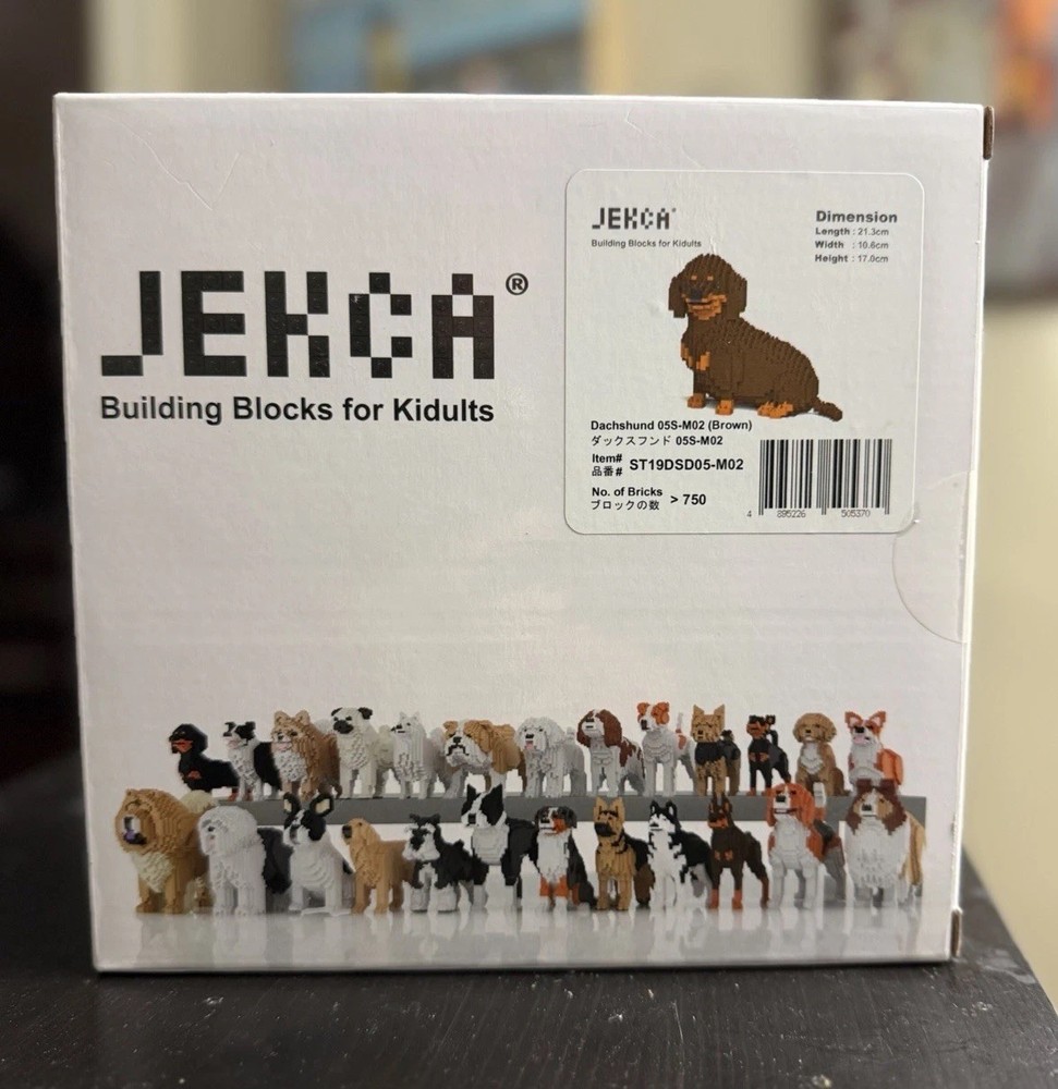Jekca Animals – Dachshund Sitting Brown 17cm