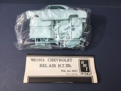 Pair of AMT ’51 Chevys. 1 Convert. Factory sealed 1 Sedan open box 608,6607
