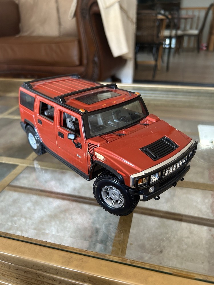 Vintage Maisto Orange Hummer Figurine “Avon” 1/24 diecast Collectible Rare
