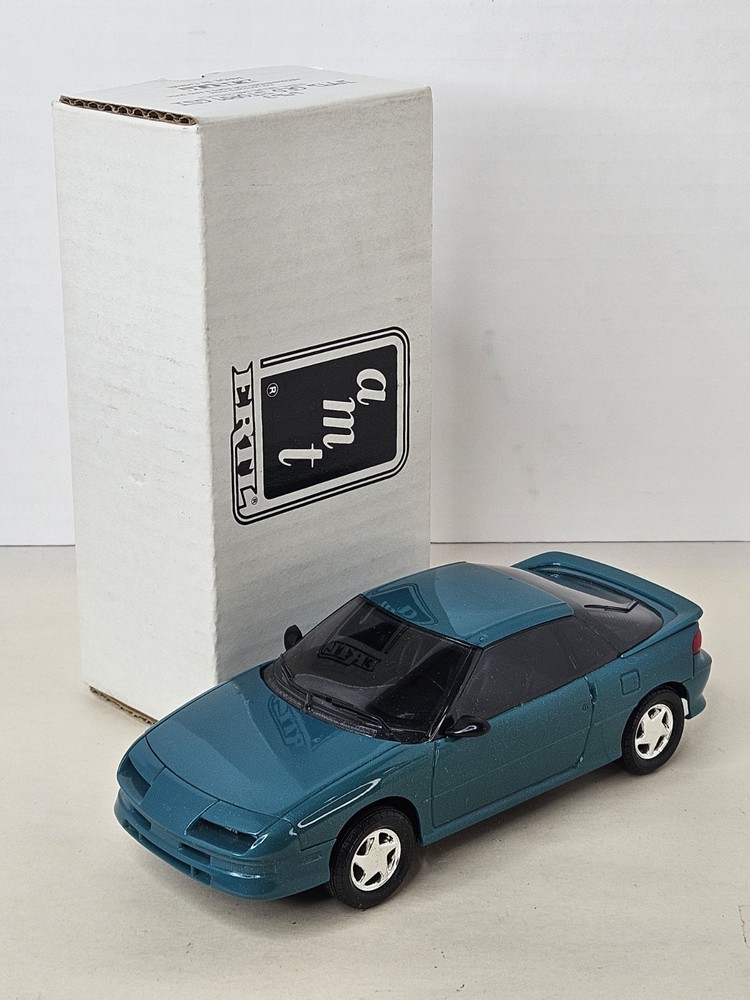 AMT Ertl 1991 Geo Storm GSI Teal Blue Metallic Dealer Promo Model Car 6963 1:25