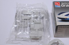 AMT ERTL GULDSTRAND GRAND SPORT 90 SCALE 1:25 MODEL KIT 6461