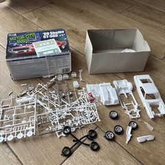 two 1:25 scale plastic model kits- ‘49 Mercury and ‘69 Shelby GT-500