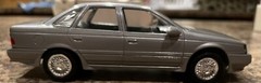 NIB Ertl 1/24 scale 1989 Ford Taurus SHO ( Titanium Met ) promo model #6054