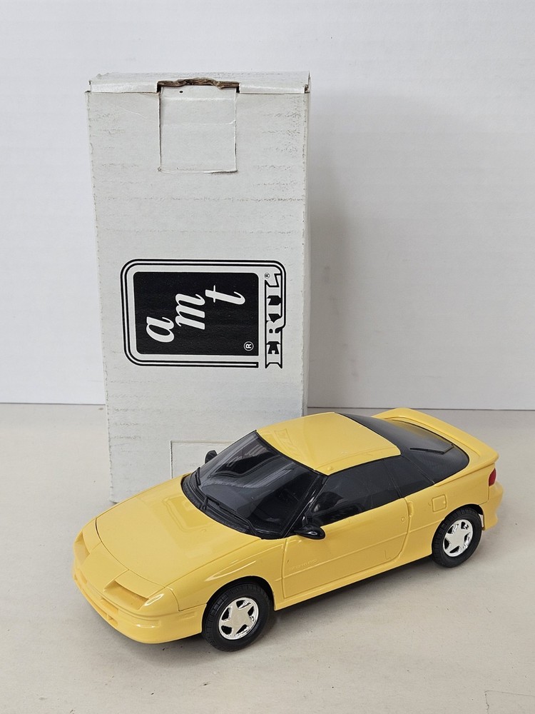 AMT Ertl 1991 Geo Storm GSI Yellow Dealer Promo Model Car 6083 1:25 NIB