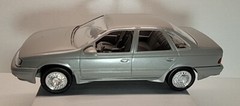 NIB Ertl 1/24 scale 1989 Ford Taurus SHO ( Titanium Met ) promo model #6054