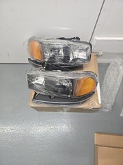 Headlight Assembly Compatible with 1999-2006 GMC Sierra 1500 Black/Clear/Clear
